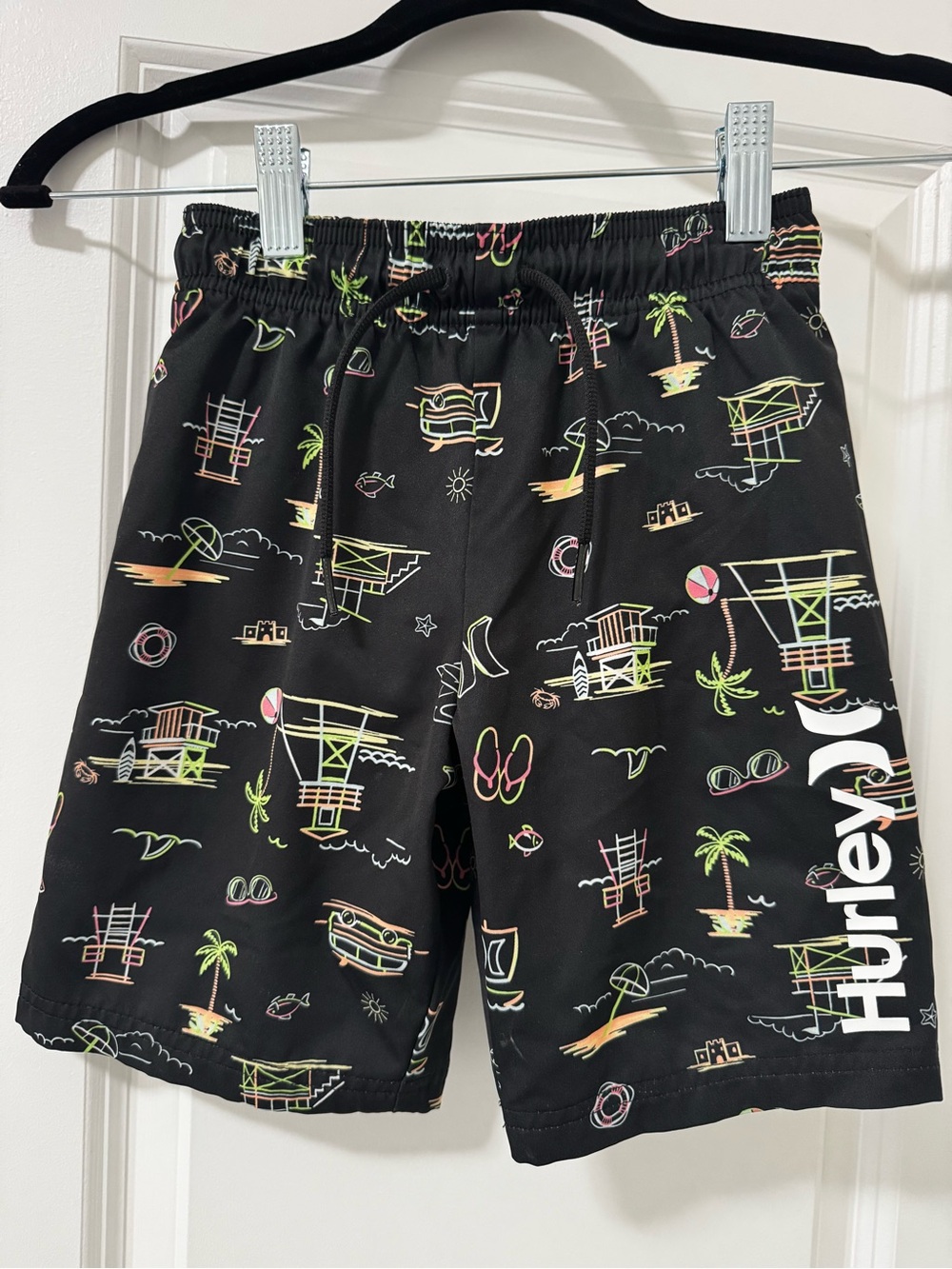Boy’s Hurley Black Swim Shorts with Neon Lifeguard & Beach Print.